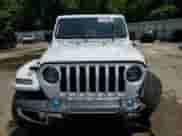 2022 Jeep Wrangler Unlimited Sahara with VIN 1C4JJXP69NW223291, listed as a Copart auction lot 64458055 with 24,574 mi miles and Salvage title. Bid and sale history available at DreamBid. Image 5.