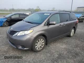 2014 Toyota Sienna LE with VIN 5TDJK3DC1ES075847, listed as a Copart auction lot 71726405 with 330,561 mi miles and Salvage title. Bid and sale history available at DreamBid. Image 1.