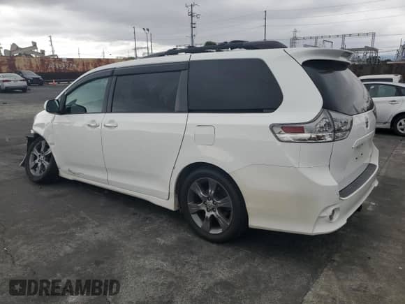 2015 Toyota Sienna SE with VIN 5TDXK3DC4FS663754, listed as a Copart auction lot 65745835 with 100,446 mi miles and Salvage title. Bid and sale history available at DreamBid. Image 2.