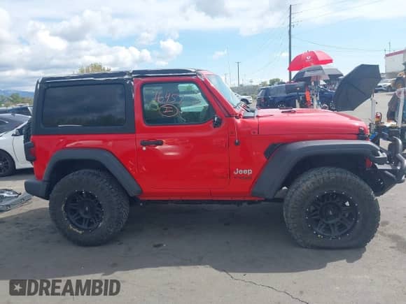 2019 Jeep Wrangler Sport S with VIN 1C4GJXAG4KW652569, listed as a IAAI auction lot 42116457 with 46,007 mi miles and . Bid and sale history available at DreamBid. Image 14.