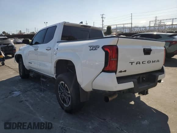 2024 Toyota Tacoma SR5 with VIN 3TMLB5JN1RM062810, listed as a Copart auction lot 80575815 with 11,680 mi miles and Salvage title. Bid and sale history available at DreamBid. Image 2.