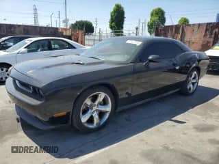 2012 Dodge Challenger R/T Plus with VIN 2C3CDYBT7CH264070, listed as a Copart auction lot 57353955 with 91,851 mi miles and Salvage title. Bid and sale history available at DreamBid. Image 1.