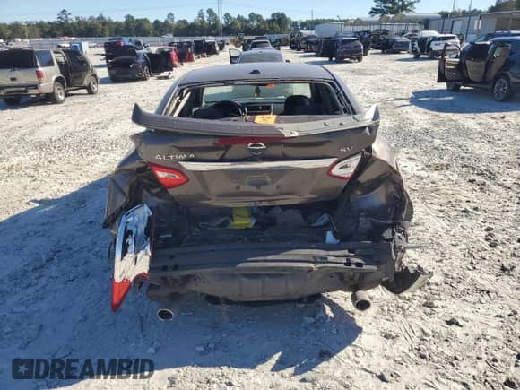 2016 Nissan Altima SR with VIN 1N4AL3AP0GC117651, listed as a Copart auction lot 86687115 with 164,256 mi miles and Salvage title. Bid and sale history available at DreamBid. Image 6.