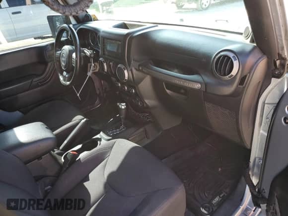 2014 Jeep Wrangler Sport with VIN 1C4AJWAG0EL126249, listed as a Copart auction lot 57768575 with 136,981 mi miles and Salvage title. Bid and sale history available at DreamBid. Image 8.