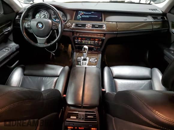 2013 BMW 7 Series 750i xDrive with VIN WBAYB6C59DD223852, listed as a Copart auction lot 49304695 with 124,989 mi miles and Salvage title. Bid and sale history available at DreamBid. Image 8.