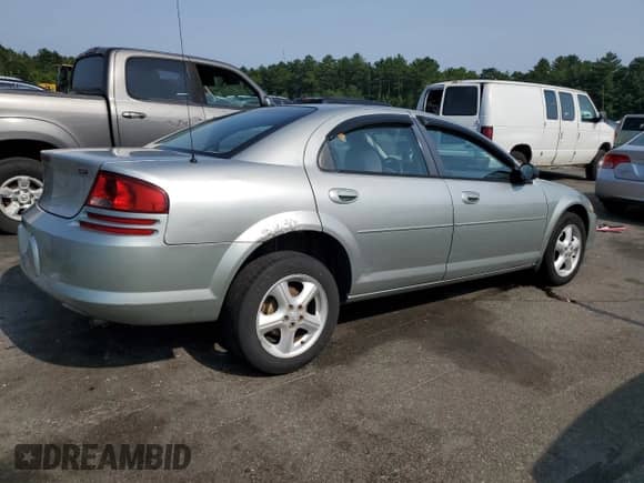 2004 Dodge Stratus SXT with VIN 1B3EL46X64N320877, listed as a Copart auction lot 62093375 with 76,818 mi miles and Salvage title. Bid and sale history available at DreamBid. Image 3.