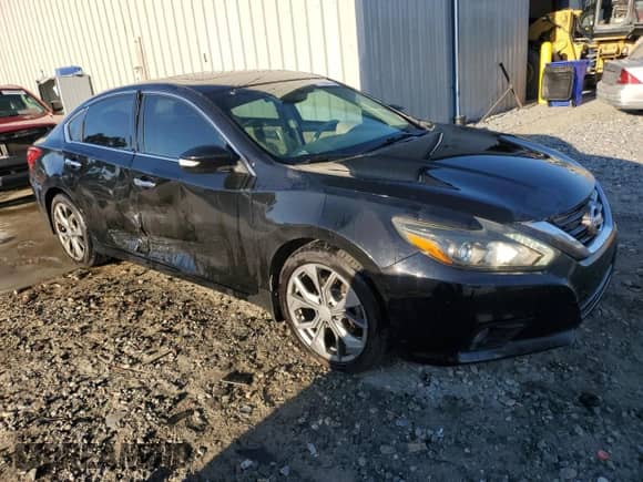 2016 Nissan Altima SR with VIN 1N4AL3AP2GC194683, listed as a Copart auction lot 71788155 with 121,994 mi miles and Salvage title. Bid and sale history available at DreamBid. Image 4.
