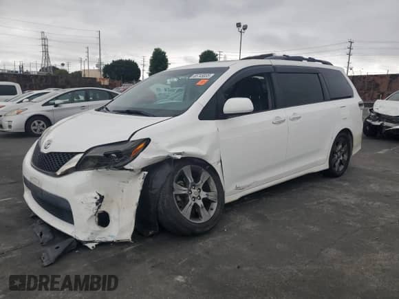 2015 Toyota Sienna SE with VIN 5TDXK3DC4FS663754, listed as a Copart auction lot 65745835 with 100,446 mi miles and Salvage title. Bid and sale history available at DreamBid. Image 1.