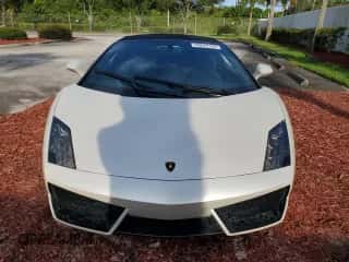 2012 Lamborghini Gallardo с VIN ZHWGU6BZ7CLA11933, выставлен на аукционе Copart как лот 74679154 с пробегом Не указан миль и Списание • Salvage title. История ставок и продаж доступна на DreamBid. Изображение 5.