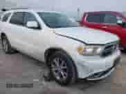 2014 Dodge Durango Limited with VIN 1C4RDHDG5EC390844, listed as a IAAI auction lot 43154876 with 76,496 mi miles and . Bid and sale history available at DreamBid. Image 1.