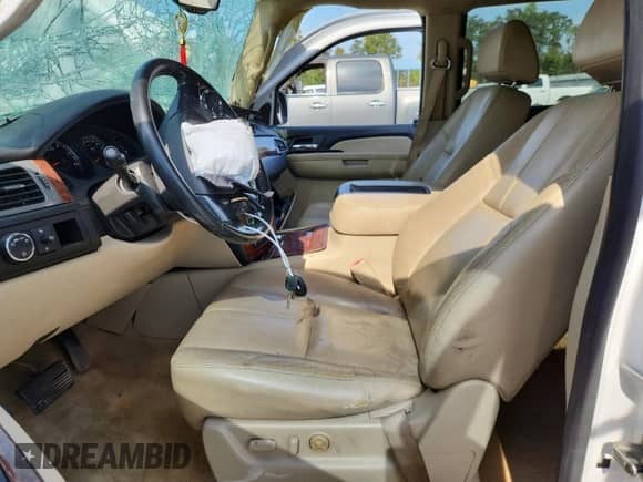 2008 Chevrolet Tahoe LTZ с VIN 1GNFC13078R163293, выставлен на аукционе Copart как лот 80201545 с пробегом 228 289 миль миль и Списание • Salvage title. История ставок и продаж доступна на DreamBid. Изображение 7.
