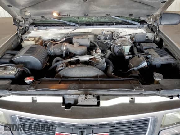 1998 GMC Sierra 1500 z VIN 1GTEC19M6WE521695, wystawiony jako Copart lot #57963205 z przebiegiem 282 910 mil mil oraz Szkoda całkowita • Salvage title. Historia ofert i sprzedaży dostępna na DreamBid. Obrazek 11.