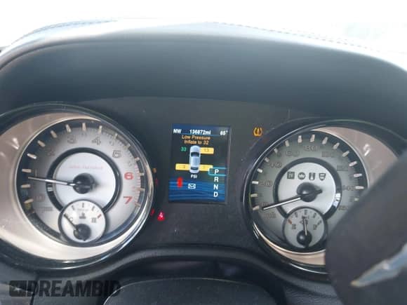 2013 Chrysler 300 C John Varvatos Limited Edition with VIN 2C3CCADT1DH744906, listed as a IAAI auction lot 42145934 with 136,872 mi miles and . Bid and sale history available at DreamBid. Image 7.