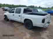 2002 Dodge Dakota with VIN 1B7HL38ZX2S625110, listed as a IAAI auction lot 42511915 with 262,217 mi miles and . Bid and sale history available at DreamBid. Image 3.