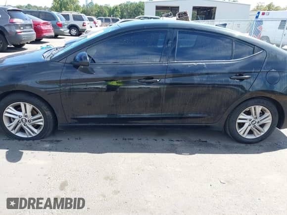 2019 Hyundai Elantra Value Edition z VIN 5NPD84LF3KH415840, wystawiony jako IAAI lot #43376034 z przebiegiem 157 855 mil mil oraz . Historia ofert i sprzedaży dostępna na DreamBid. Obrazek 14.