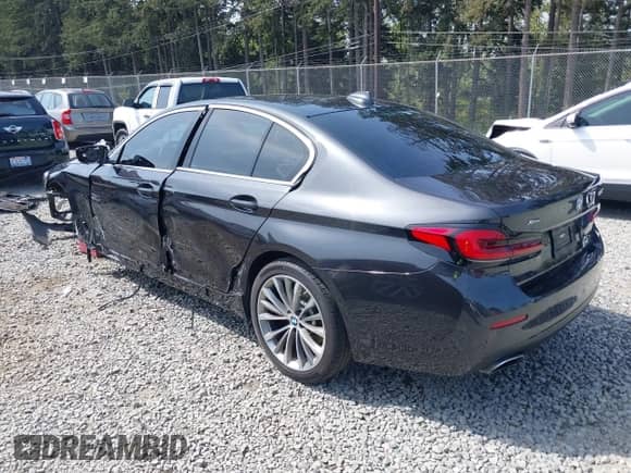 2022 BMW 5 Series 530i xDrive with VIN WBA13BJ09NWX51234, listed as a IAAI auction lot 42106974 with 26,480 mi miles and . Bid and sale history available at DreamBid. Image 3.