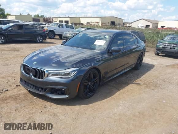 2016 BMW 7 Series 750i xDrive with VIN WBA7F2C51GG416492, listed as a IAAI auction lot 43127235 with 115,379 mi miles and . Bid and sale history available at DreamBid. Image 2.