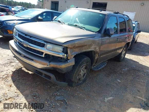 2004 Chevrolet Tahoe LS with VIN 1GNEK13Z34R304352, listed as a IAAI auction lot 41565612 with 291,777 mi miles and . Bid and sale history available at DreamBid. Image 2.