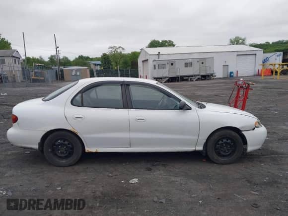 1998 Hyundai Elantra with VIN KMHJF24M5WU664139, listed as a IAAI auction lot 42253898 with 143,360 mi miles and . Bid and sale history available at DreamBid. Image 13.