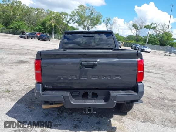 2025 Toyota Tacoma SR5 with VIN 3TMKB5FNXSM033896, listed as a IAAI auction lot 42973626 with 2,401 mi miles and . Bid and sale history available at DreamBid. Image 16.