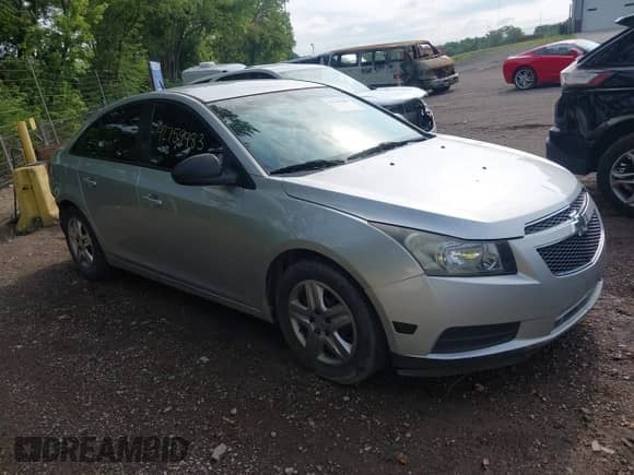 2013 Chevrolet Cruze LS with VIN 1G1PB5SG3D7272323, listed as a IAAI auction lot 42759483 with 138,060 mi miles and . Bid and sale history available at DreamBid. Image 1.