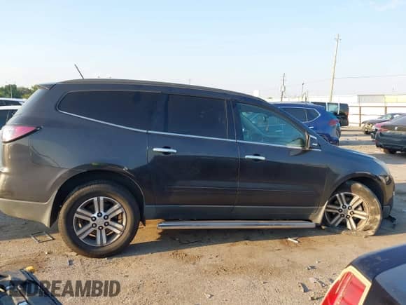2015 Chevrolet Traverse LT z VIN 1GNKRHKD6FJ374121, wystawiony jako IAAI lot #43220608 z przebiegiem Nie podano mil oraz . Historia ofert i sprzedaży dostępna na DreamBid. Obrazek 14.