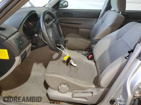 2006 Subaru Forester X with VIN JF1SG636X6H754367, listed as a Copart auction lot 66030175 with 185,311 mi miles and Salvage title. Bid and sale history available at DreamBid. Image 7.