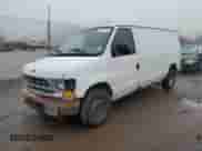 2001 Ford Econoline Cargo z VIN 1FTRE142X1HB27593, wystawiony jako Copart lot #83827154 z przebiegiem 190 761 mil mil oraz Szkoda całkowita • Salvage title. Historia ofert i sprzedaży dostępna na DreamBid. Obrazek 1.
