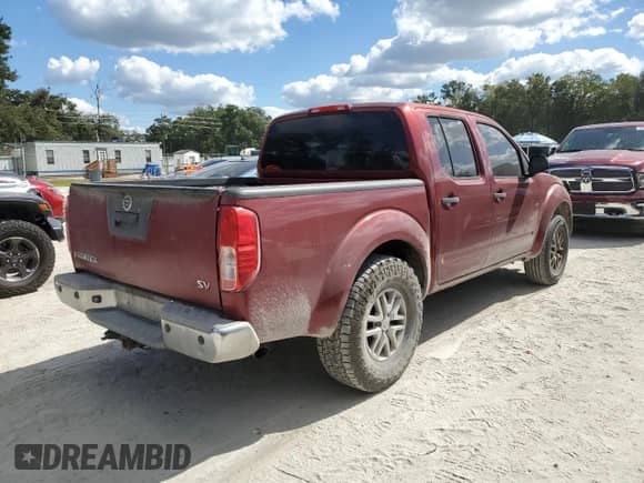2015 Nissan Frontier S with VIN 1N6AD0ER7FN730481, listed as a Copart auction lot 87238245 with 133,782 mi miles and Clean title. Bid and sale history available at DreamBid. Image 3.