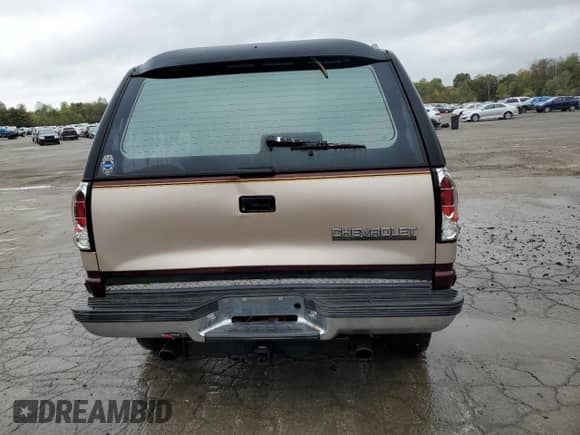 1993 Chevrolet Blazer с VIN 1GNEK18K1PJ396916, выставлен на аукционе Copart как лот 72332554 с пробегом 80 099 миль миль и Списание • Salvage title. История ставок и продаж доступна на DreamBid. Изображение 6.