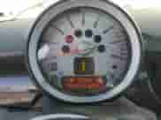 2007 MINI Hardtop with VIN WMWMF33547TT51590, listed as a Copart auction lot 57323995 with 114,113 mi miles and Salvage title. Bid and sale history available at DreamBid. Image 9.