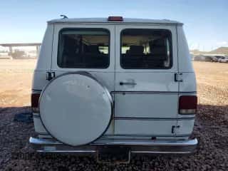1995 Chevrolet Chevy Van with VIN 1GBEG25K4SF190770, listed as a Copart auction lot 84057735 with 176,001 mi miles and Clean title. Bid and sale history available at DreamBid. Image 6.