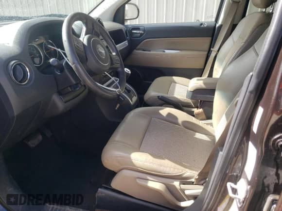 2014 Jeep Compass Latitude with VIN 1C4NJCEA4ED643134, listed as a Copart auction lot 71044335 with 103,025 mi miles and Salvage title. Bid and sale history available at DreamBid. Image 7.