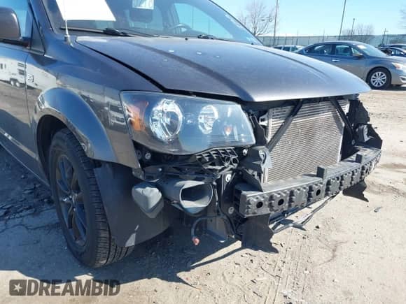 2019 Dodge Grand Caravan SE с VIN 2C4RDGBG4KR787784, выставлен на аукционе IAAI как лот 41624411 с пробегом 74 454 миль миль и . История ставок и продаж доступна на DreamBid. Изображение 18.