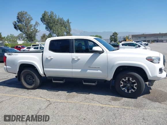 2017 Toyota Tacoma SR5 with VIN 3TMAZ5CN1HM037971, listed as a IAAI auction lot 42658632 with 67,228 mi miles and . Bid and sale history available at DreamBid. Image 13.