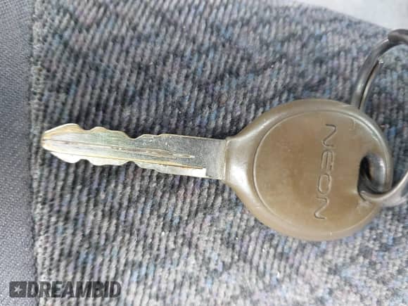 2002 Dodge Neon ES z VIN 1B3ES56C12D613675, wystawiony jako IAAI lot #41531666 z przebiegiem 160 671 mil mil oraz . Historia ofert i sprzedaży dostępna na DreamBid. Obrazek 11.