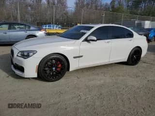 2015 BMW 7 Series 750i xDrive with VIN WBAYB6C50FD225492, listed as a Copart auction lot 50018225 with 76,059 mi miles and Salvage title. Bid and sale history available at DreamBid. Image 1.