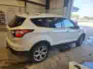 2017 Ford Escape Titanium с VIN 1FMCU9J90HUA46981, выставлен на аукционе Copart как лот 81252645 с пробегом 98 545 миль миль и На запчасти • Non repairable. История ставок и продаж доступна на DreamBid. Изображение 3.