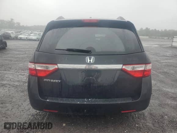 2013 Honda Odyssey EX-L с VIN 5FNRL5H63DB042867, выставлен на аукционе Copart как лот 81099535 с пробегом 186 662 миль миль и Чистый • Clean title. История ставок и продаж доступна на DreamBid. Изображение 6.