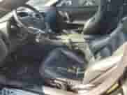 2006 Chevrolet Corvette с VIN 1G1YY36U865125842, выставлен на аукционе Copart как лот 71679785 с пробегом 77 772 миль миль и Чистый • Clean title. История ставок и продаж доступна на DreamBid. Изображение 7.