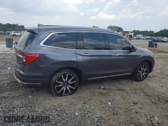 2021 Honda Pilot Touring 8-Passenger с VIN 5FNYF6H95MB048494, выставлен на аукционе Copart как лот 61347115 с пробегом 174 016 миль миль и Списание • Salvage title. История ставок и продаж доступна на DreamBid. Изображение 3.