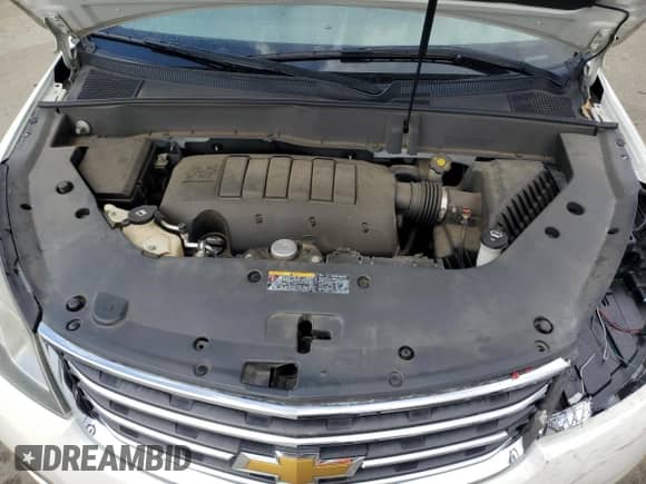 2014 Chevrolet Traverse LT с VIN 1GNKRGKD7EJ191609, выставлен на аукционе Copart как лот 81529515 с пробегом 168 830 миль миль и Списание • Salvage title. История ставок и продаж доступна на DreamBid. Изображение 12.