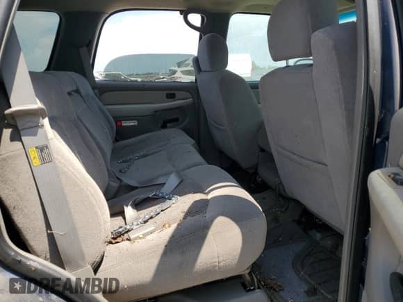 2002 Chevrolet Tahoe LS z VIN 1GNEC13V62R148217, wystawiony jako Copart lot #58536635 z przebiegiem Nie podano mil oraz Czysty tytuł • Clean title. Historia ofert i sprzedaży dostępna na DreamBid. Obrazek 11.