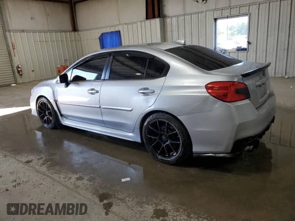 2016 Subaru WRX Premium with VIN JF1VA1E69G8826675, listed as a Copart auction lot 69312685 with 145,791 mi miles and Salvage title. Bid and sale history available at DreamBid. Image 2.