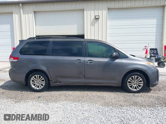 2011 Toyota Sienna XLE AAS with VIN 5TDYK3DC1BS122532, listed as a IAAI auction lot 43271960 with 229,353 mi miles and . Bid and sale history available at DreamBid. Image 13.