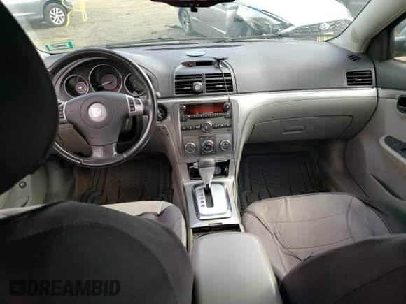 2009 Saturn Aura XE с VIN 1G8ZS57B49F193859, выставлен на аукционе Copart как лот 57359394 с пробегом 145 731 миль миль и Чистый • Clean title. История ставок и продаж доступна на DreamBid. Изображение 8.