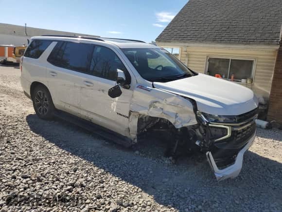 2022 Chevrolet Tahoe Z71 с VIN 1GNSKPKD9NR299218, выставлен на аукционе Copart как лот 85306395 с пробегом 49 621 миль миль и Списание • Salvage title. История ставок и продаж доступна на DreamBid. Изображение 4.