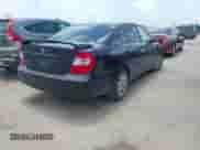 2002 Toyota Camry LE z VIN 4T1BE32K72U098901, wystawiony jako IAAI lot #42490653 z przebiegiem 120 619 mil mil oraz . Historia ofert i sprzedaży dostępna na DreamBid. Obrazek 4.