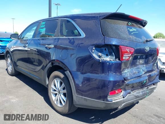 2020 Kia Sorento L with VIN 5XYPG4A34LG688755, listed as a IAAI auction lot 42842381 with 67,848 mi miles and . Bid and sale history available at DreamBid. Image 3.