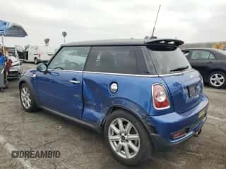 2012 MINI Hardtop S with VIN WMWSV3C56CTY17072, listed as a Copart auction lot 58275165 with 101,542 mi miles and Salvage title. Bid and sale history available at DreamBid. Image 2.